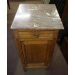 A Pair of French Oak Bedside Cabinets, Having a detachable marble top, raised above a drawer and