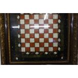A Pietra Dura Style Specimen Chess Board, circa late 19th / early 20th century, 34cm x 35cm, beneath