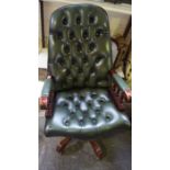 A Green Leather Button Back Swivel Desk Chair, 20th century, Raised on quadrapartite supports with