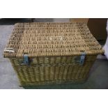 A Large Wicker Laundry Basket, circa late 19th century, with locking bar and lock, lined interior,