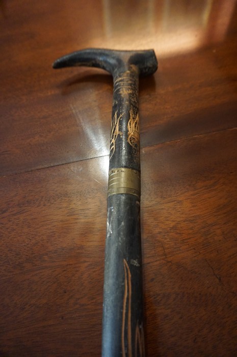 An African Style Ebonised Sword Stick, Decorated with carved panels, blade 48cm long, overall 96cm - Image 3 of 3