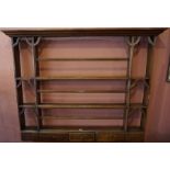 A Set of Mahogany Hanging Wall Shelves, circa 19th century, Having open shelving above five spice