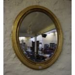 A Gilt Framed Bevelled Glass Oval Wall Mirror, circa 19th century, 101cm high, 85cm wideCondition