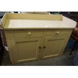 A Victorian Painted Pine Dresser, Having a three quarter gallery top, above two small drawers and