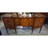 A Reproduction Mahogany Sideboard, In the Regency style, 20th century, Having two drawers, flanked