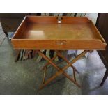 A Mahogany Butlers Tray on Folding Stand, circa 19th century, 87cm high, 76cm wide Condition