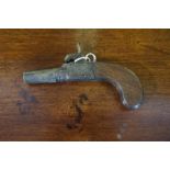 A Box Lock Percussion Pistol by Bury of London, Having a turn off barrel, folding trigger,