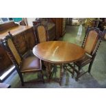 A Composite Oak Dining Room Suite, Comprising of a sideboard, drop leaf table, raised on barley