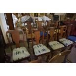 A Set of Eight Irish Mahogany Dining Chairs, circa late 19th century, Having a splat back above