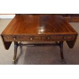 A Regency Mahogany and Ebony Strung Sofa Table, circa early 19th century, Of large form, having