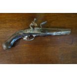 A Middle Eastern Pistol, circa 19th century, Having steel and brass furniture, the top of barrel