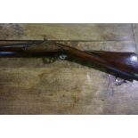 A Single Barrel Flintlock Sporting Gun, circa 19th century, Having a full walnut stock, engraved