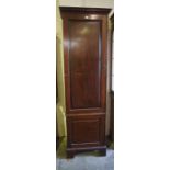 A Mahogany Bookcase, circa late 19th century, Having two doors, enclosing a shelved interior,