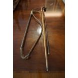 A Riding Crop by Swaine & Adeney, circa 1930s, Having an antler handle, leather clad shaft, with