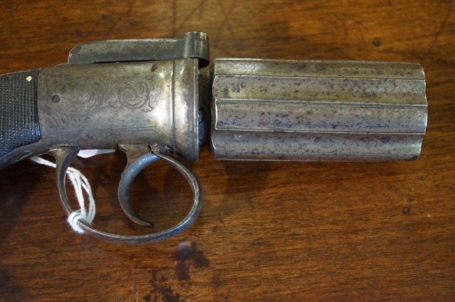 A Six Shot Pepperbox Revolver, circa 19th century, Having an engraved action and butt plate, proof - Image 2 of 4