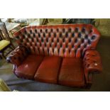 A Chesterfield Ox Blood Leather Three Seater Sofa, 88cm high, 180cm wide,