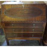 A Mahogany Writing Bureau, circa 1930s, Having a fall front enclosing fitted drawers and