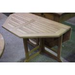 A New 4ft Teak Garden Gateleg Table, Of octagonal form, 76cm high, 134cm wide