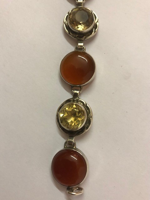 A Scottish Silver Mounted Flexible Bracelet, Set with four carnelian style cabochons and three - Image 2 of 4