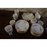 A Twelve Piece Paragon FIne Bone China Tea Set, Decorated with floral panels on a white ground, with