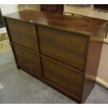 A Retro Rosewood Stereo Unit by Cado, After Poul Cadovius, (Danish) Having four sliding doors,