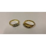 A Ladies 18ct Gold Gem Set and Diamond Ring, Set with three small gem stones and two small diamonds,