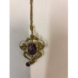 A 9ct Gold Amethyst and Seed Pearl Pendant, circa early 20th century, Set with a large amethyst to