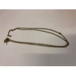 A Ladies Yellow Metal Long Guard Chain, Probably unmarked gold, circa late 19th century, overall