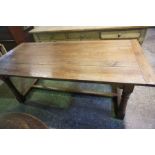 An Oak Refectory Table, circa late 19th / early 20th century, Having a rectangular plank top, raised