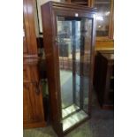 A Mahogany Shop Display Cabinet, circa early 20th century, Having a glazed door, lacking shelves,