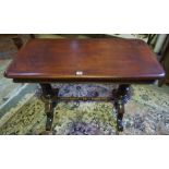 A Victorian Mahogany Silver Style Table, Having a plain rectangular top, raised on turned columns,