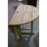 A New 4ft Teak Garden Gateleg Table, Of circular form, 76cm high, 130cm wide