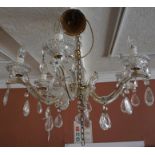 A Venetian Style Glass Chandelier, Having six branches with suspended glass pear shaped drops,