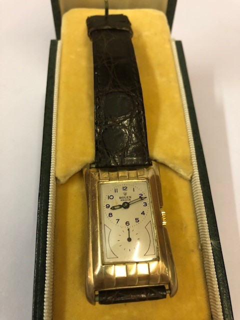 A Gold Rolex Prince Chronometre Wristwatch, circa 1930s, Having a silvered dial with subsidiary