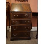 A Ladies Mahogany Writing Bureau, Having a fall front with a tooled leather inset, resting on
