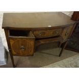 A Regency Style Mahogany Sideboard, Having a small drawer above a larger tambour fronted drawer,