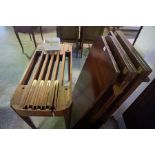 A Mahogany Concertina Action Dining Table, In the Regency style, Having three additional leaves,