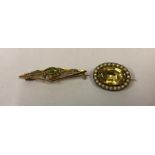 A Victorian Gem Set and Seed Pearl Brooch, The oval topaz measuring approximately 1.5cm,
