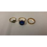 A Ladies 14ct Gold and Gem Set Ring, The blue gem stone is mounted in a claw setting, measuring