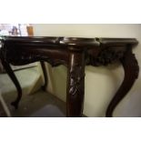 A Victorian Style Mahogany Serpentine Hall / Side Table, Raised on cabriole legs with scroll feet,