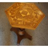 A Parquetry Inlaid Octagonal Tea Table, circa 19th century, raised on a similar period mahogany