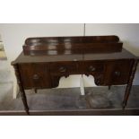 A Regency Design Mahogany Sideboard, circa 19th century, Having a central drawer, flanked with a