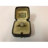 A Ladies 18ct Gold Diamond Cluster Ring, Set with seven small diamonds, stamped 18ct, overall weight