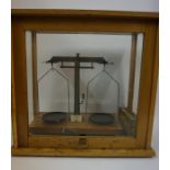 A Set of Apothecary Balance Scales by Philip Harris of Birmingham, with weights, enclosed in a