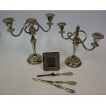 Two Silver Handled Dressing Items, 19cm, 21cm long, also with two silver plated candleabra, and a