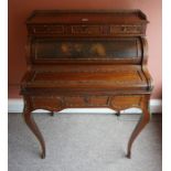 A French Walnut Bonheur De Jour, circa late 19th / early 20th century, Having a gilt metal