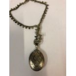 A Silver Locket on Chain, chain 19cm long, locket 4cm diameter Condition reportHinge is ok on