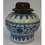 A Chinese Kangxi Style Blue and White Pottery Vase, Having a reticulated hardwood cover, Decorated