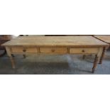A Large Victorian Pine Partners Farmhouse Table, Having a rectangular plank top, with three