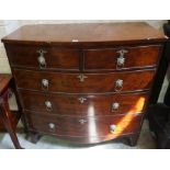 A Georgian Mahogany Bow Front Chest of Drawers, circa early 19th century, Having two small drawers